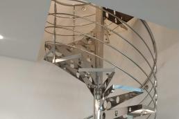 Spiral staircase. Stainless steel and glass. Metallcat