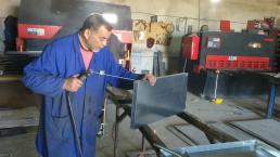 Ahmed Khelladi (Algeria). Welding of metal trays